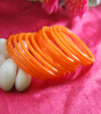 Orange glass bangles