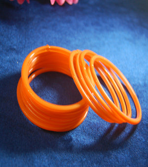 Orange glass bangles