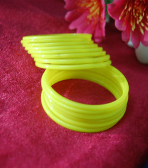 Yellow glass bangles