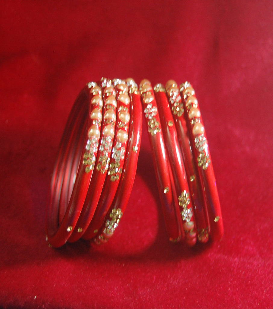 Red coloured fancy broad glass bangles