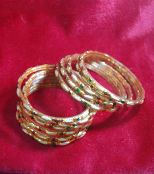 Golden glass bangles with glitters set of 16
