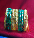 Green with sparkling golden side bangles