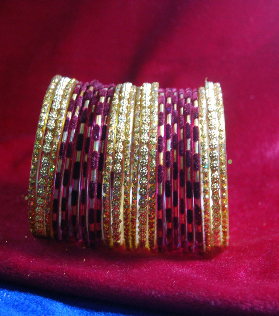 Magenta with sparkling golden side bangles