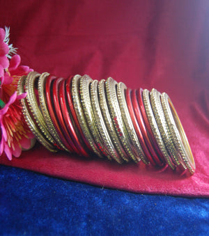 Red and golden coloured lac bangle having kangan with full work