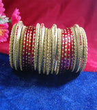Maroon and golden coloured lac bangle having broad kangan with full work