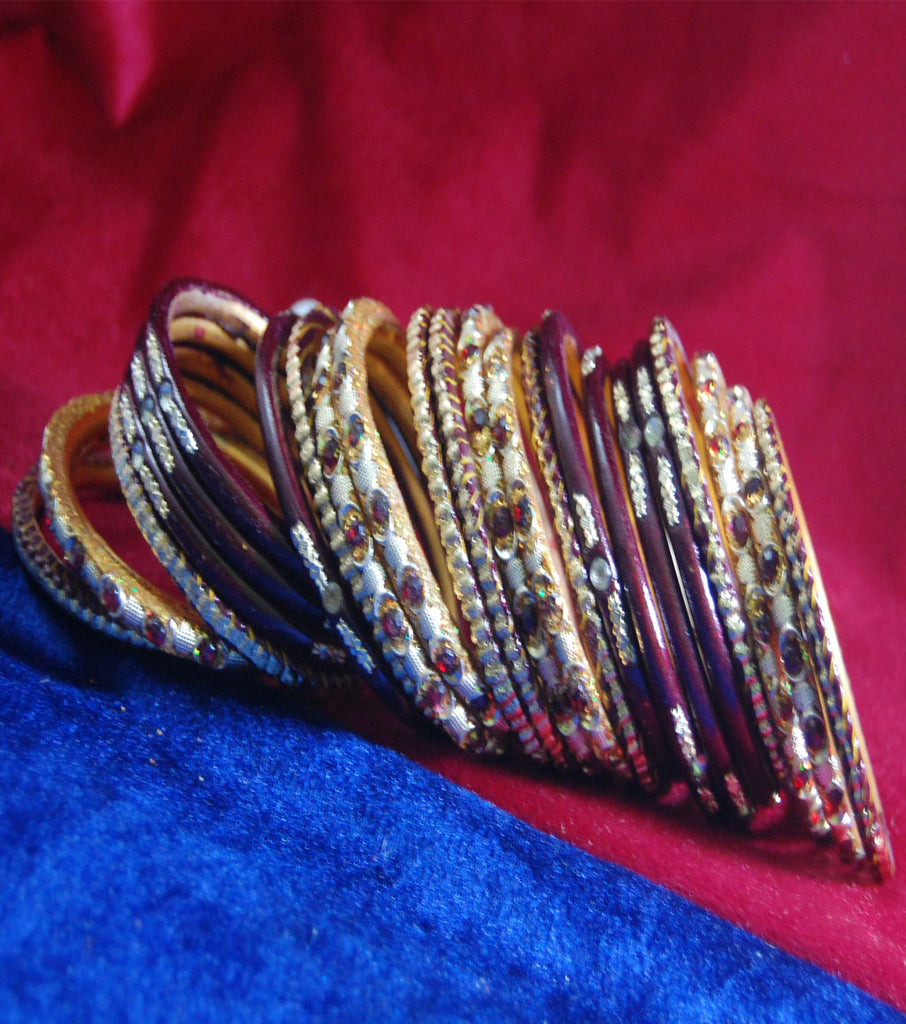 Maroon coloured lac bangle& golden kangan studded with stone