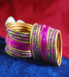 Pink colored lac bangle with laheriya print and stones