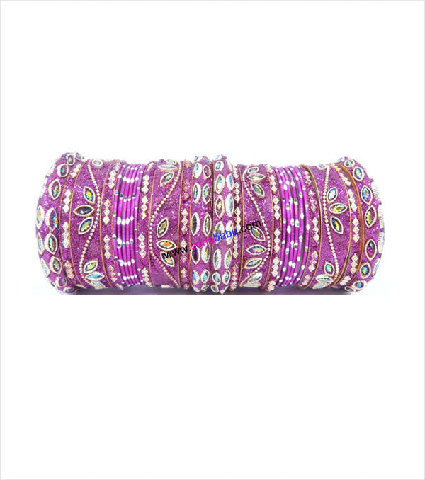 Pink coloured chura set with designer broad kangans