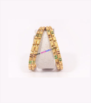 Designer Gold plated bangles with ethnic look set of 4