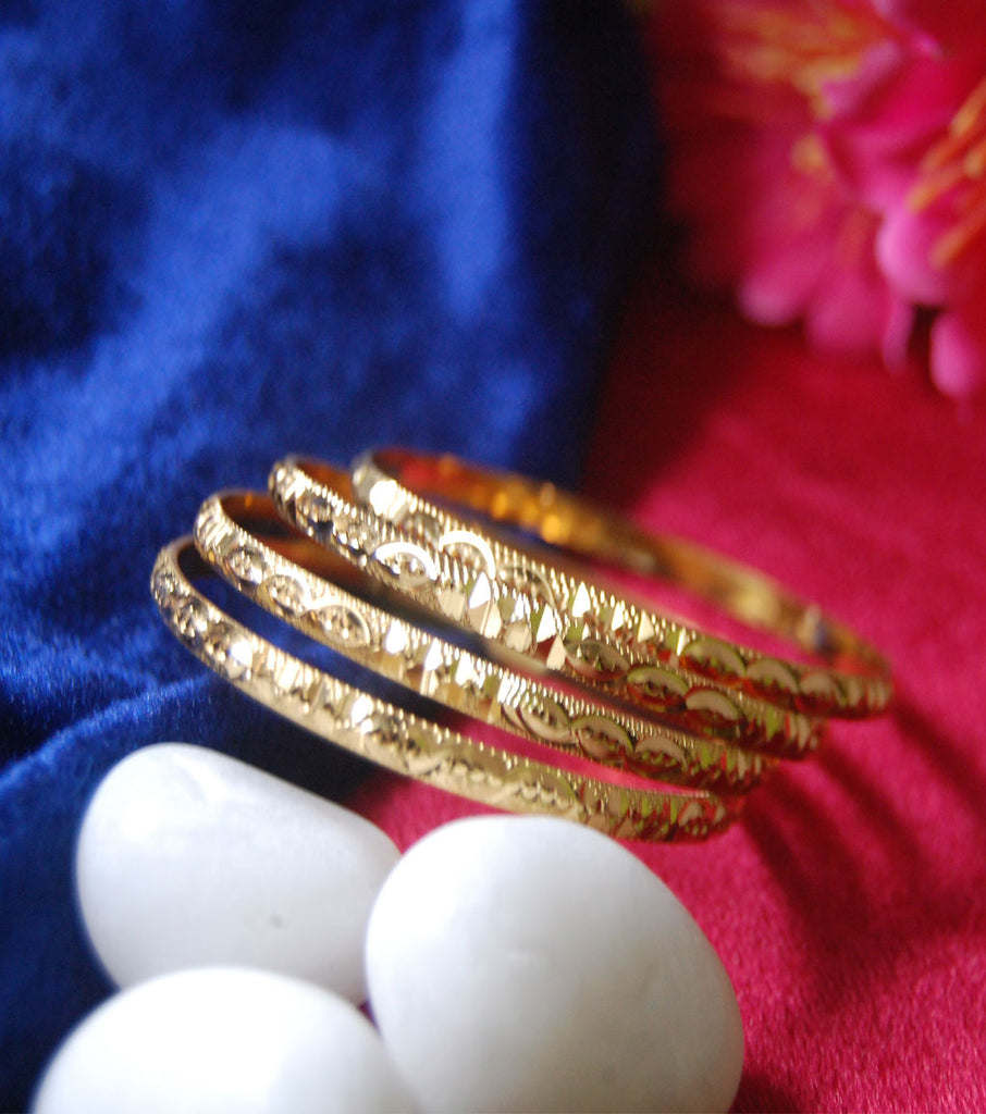 Gold plated bangles in churi style with cutting work set of 4