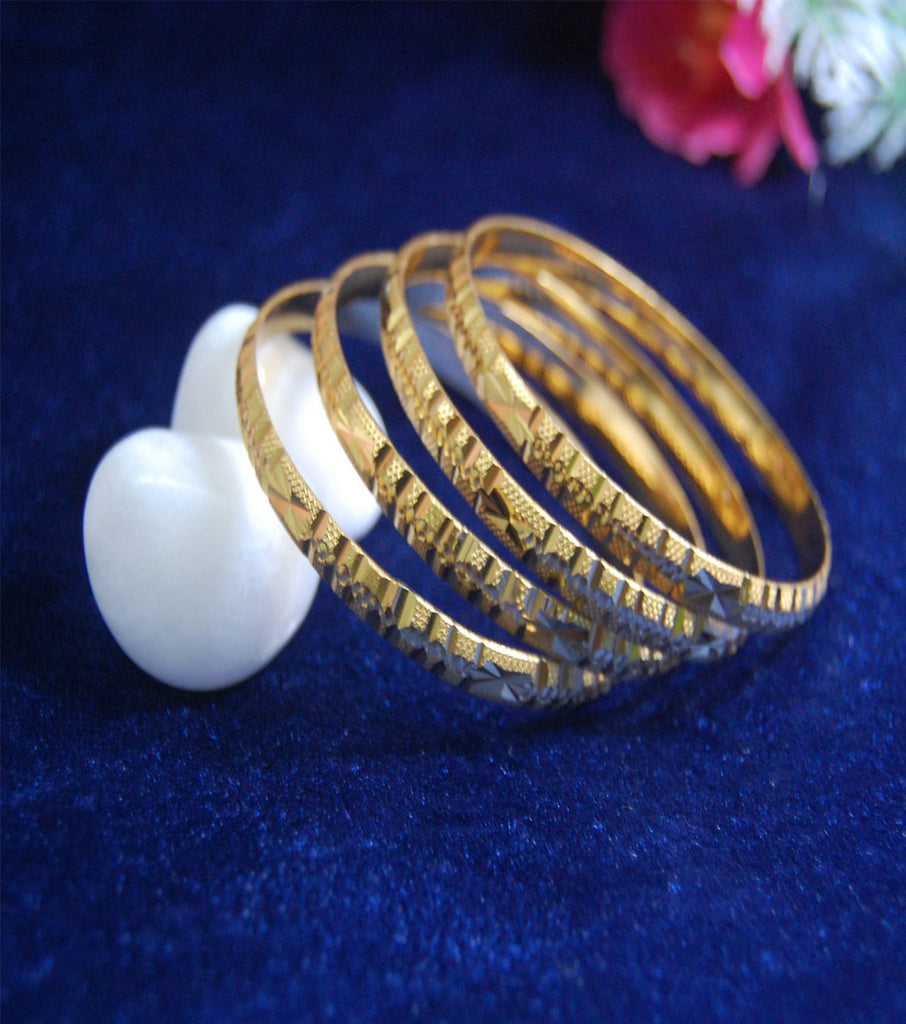 Gold plated bangles in cutting work set of 4