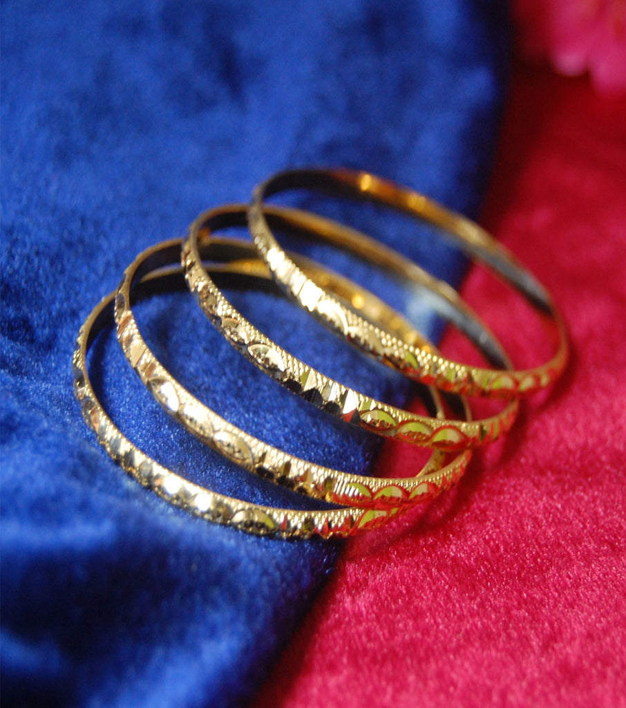 Gold plated bangles in churi style with cutting work set of 4