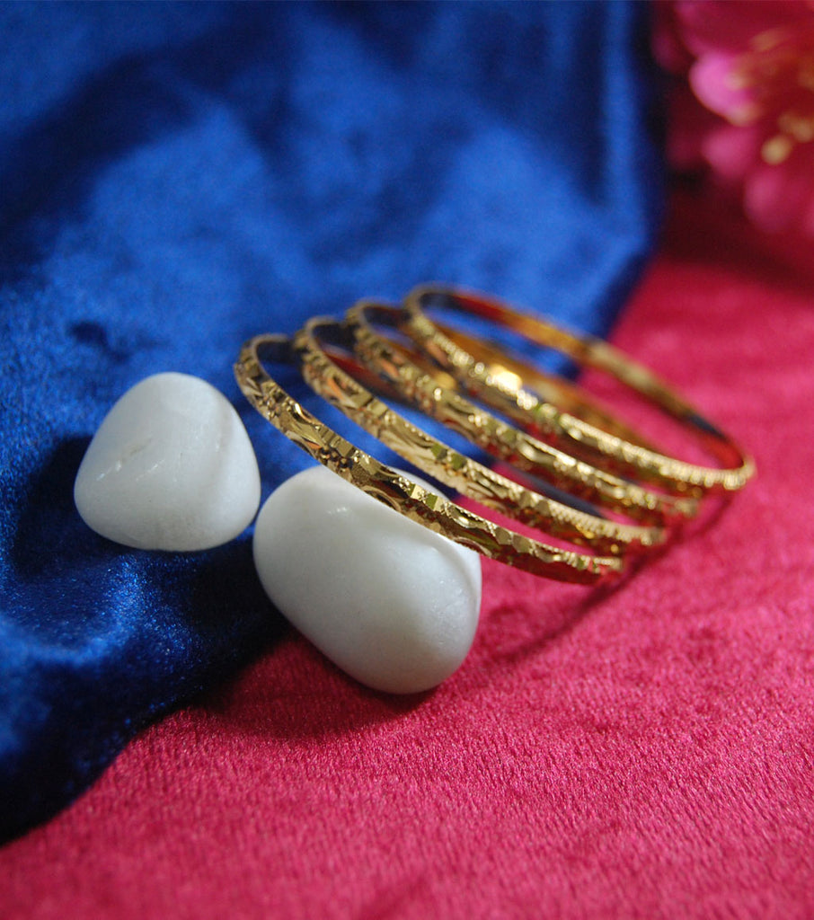 Gold plated bangles with beautiful cutting work set of 4
