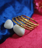 Gold plated bangles with beautiful cutting work set of 4
