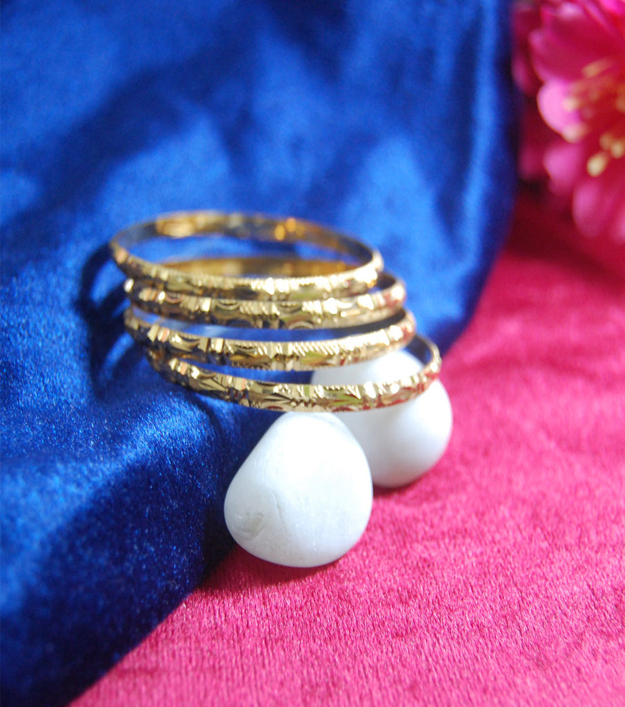 Gold plated bangles with beautiful cutting work set of 4