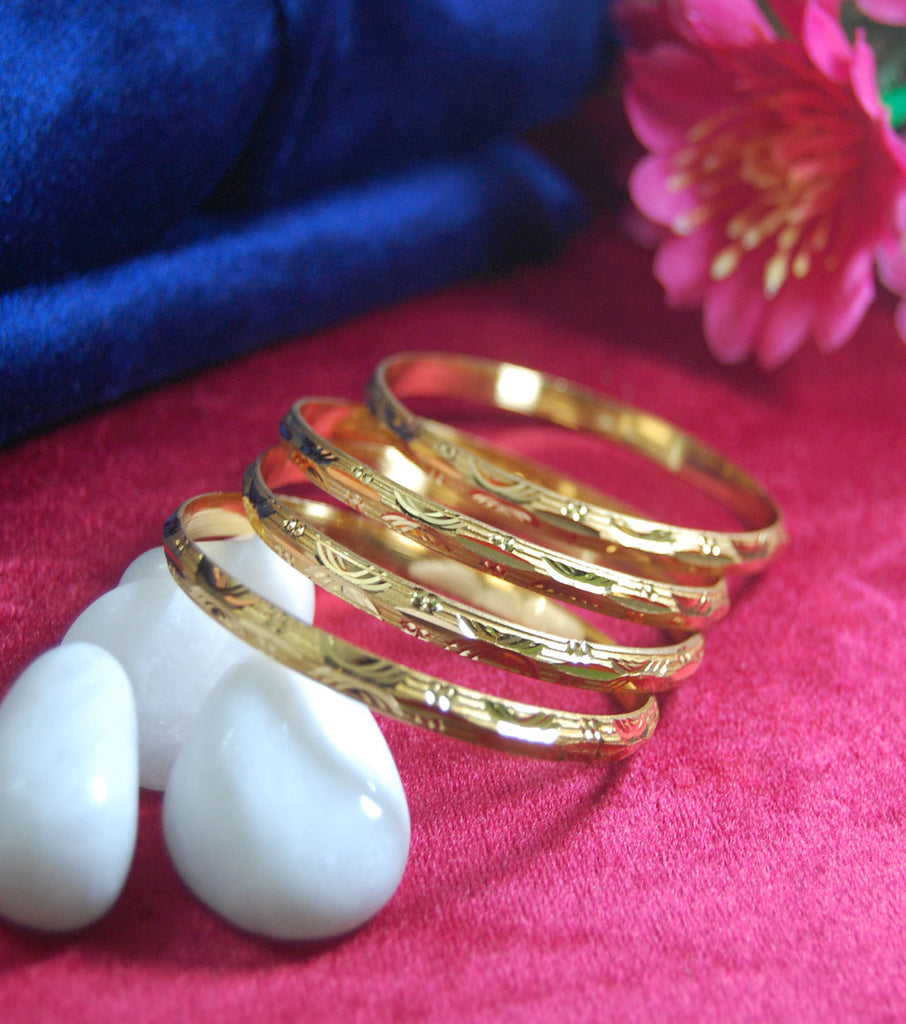 Gold plated bangles with beautiful work set of 4
