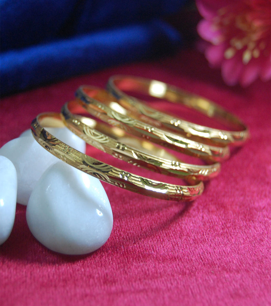 Gold plated bangles with beautiful work set of 4