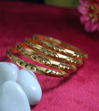 Gold plated bangles with amazing work set of 4