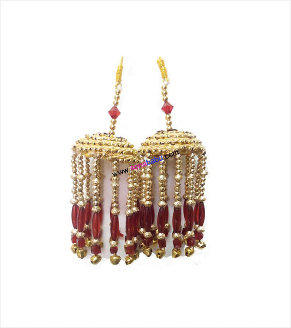 Tinkling bridal kalire in maroon golden look