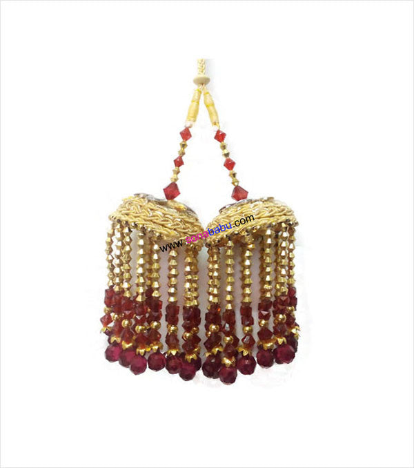 Tinkling bridal kalire in maroon golden look