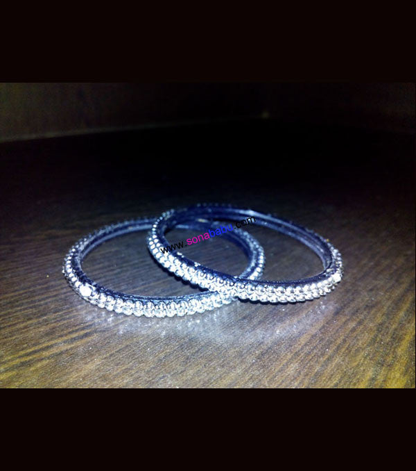 Dazzling white kids bangles set of 4