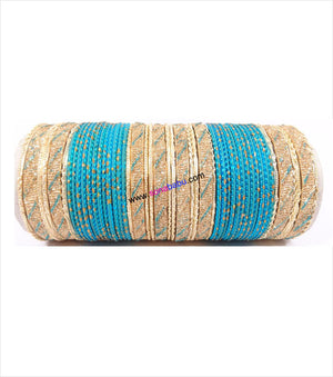 Dark ferozi and golden colored metal bangles with full work