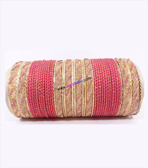 Pink and golden colored metal bangleswith full work