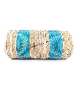 Ferozi and golden colored metal bangles with full work