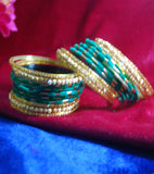 Green with sparkling golden side bangles